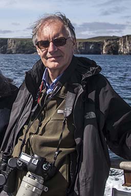 David birdwatching on a boat trip in Shetland